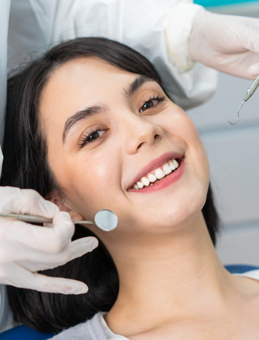 Portrait of Caucasian girl patient smiling ready for oral care checkup