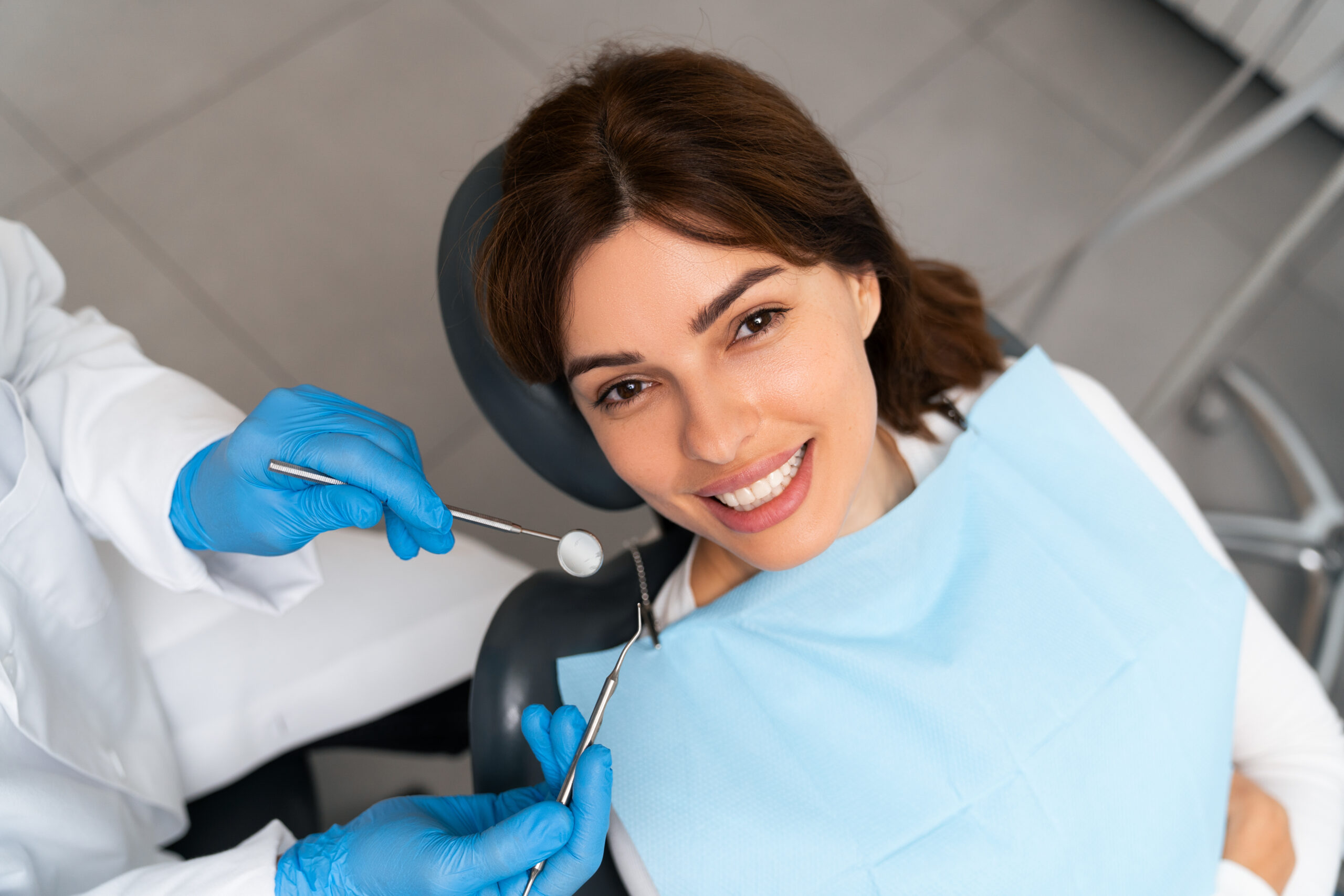Happy patient looking into the camera with a beautiful smile.